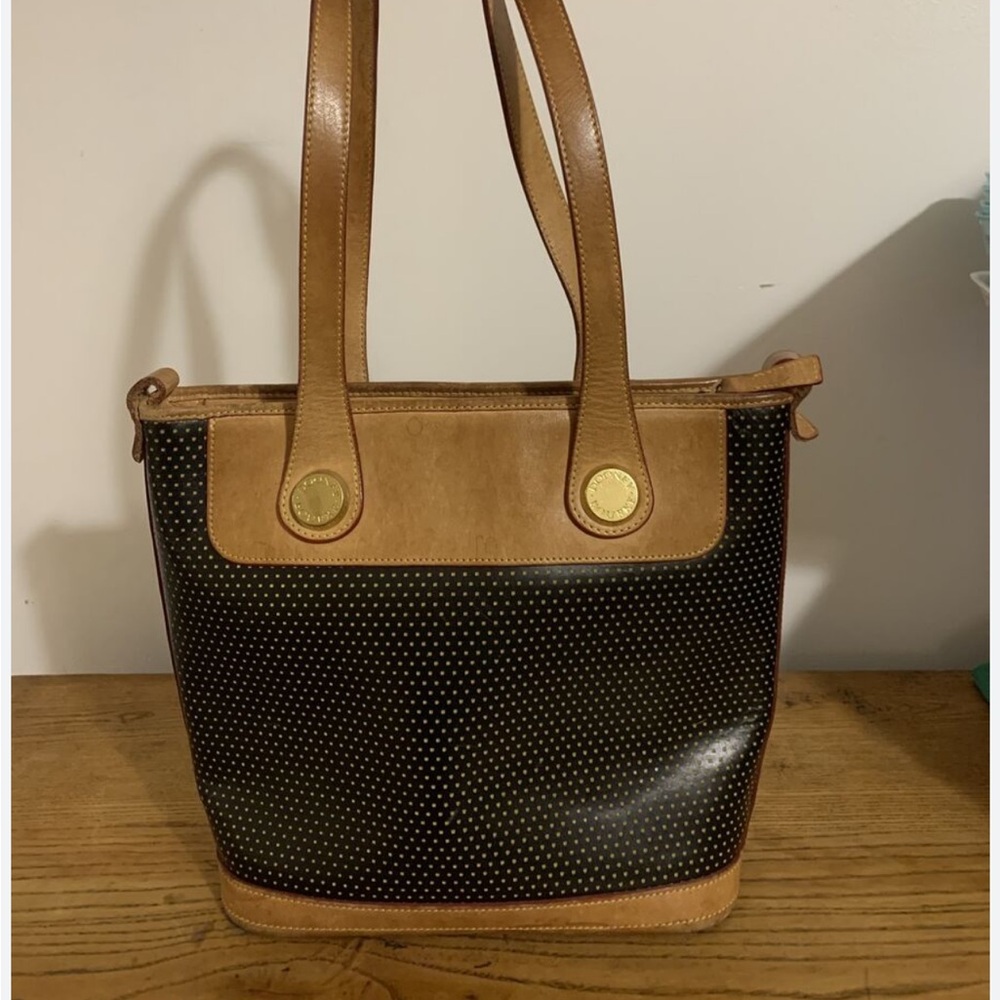 Dooney & Bourke Black and Tan Tote with Structured Shape and Textured Surface
